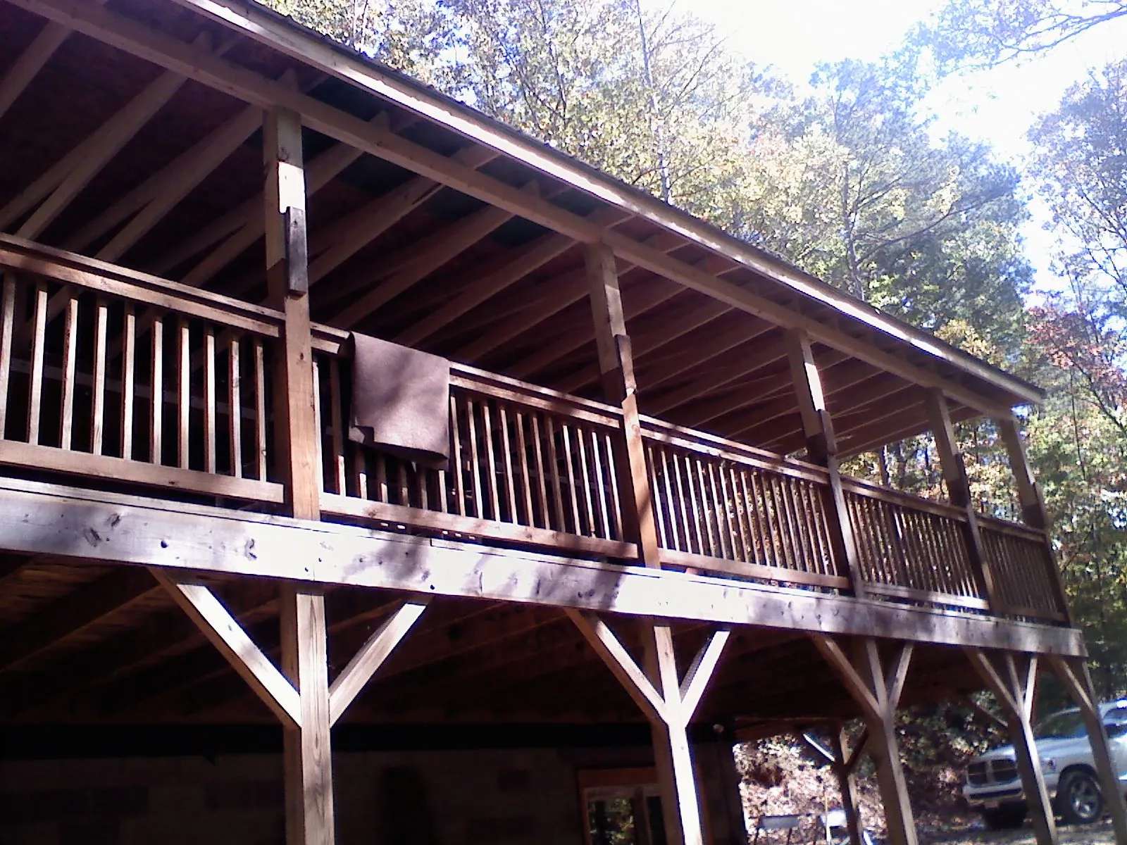 Timber framing under a new elevated porch and deck — Roof Leak Repair in Mc Cracken by Roofing Brothers